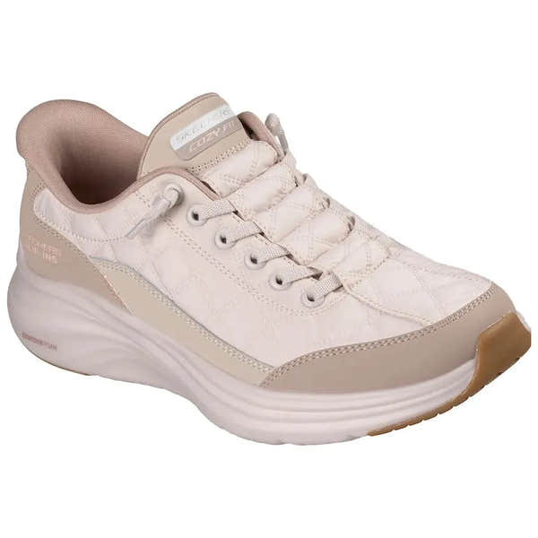 Skechers 150404 Contour Foam women's slip-on trainers in natural/taupe leather and textile, with cushioned sole and casual sporty design.