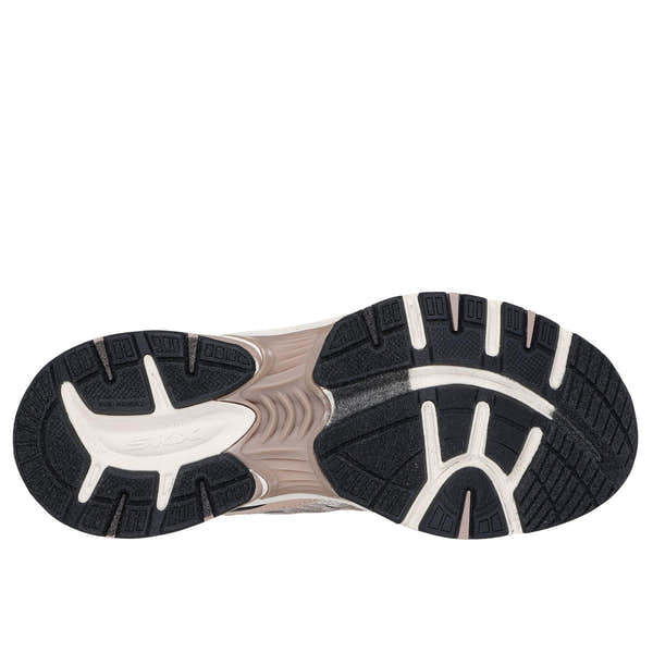 Skechers women's Stamina Sport slip-in trainers with rose leather and textile upper, cushioned sole, and flexible black and white rubber outsole.