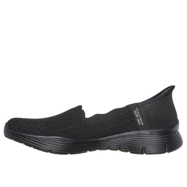 Skechers Seager Believe It women's black textile slip-on shoes with sporty design and cushioned sole.