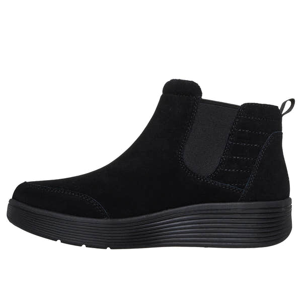 Skechers Arch Fit Laguna black suede ankle boots with pull-on design, supportive arch, and slip-resistant sole.