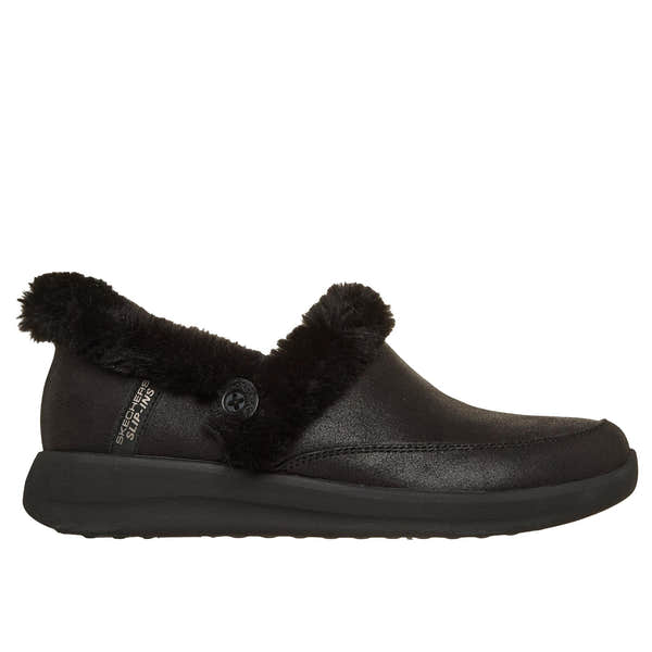 Skechers Cozy Escape slip-on slippers for women, black vegan leather with water-resistant and faux fur lining, comfort-focused design.