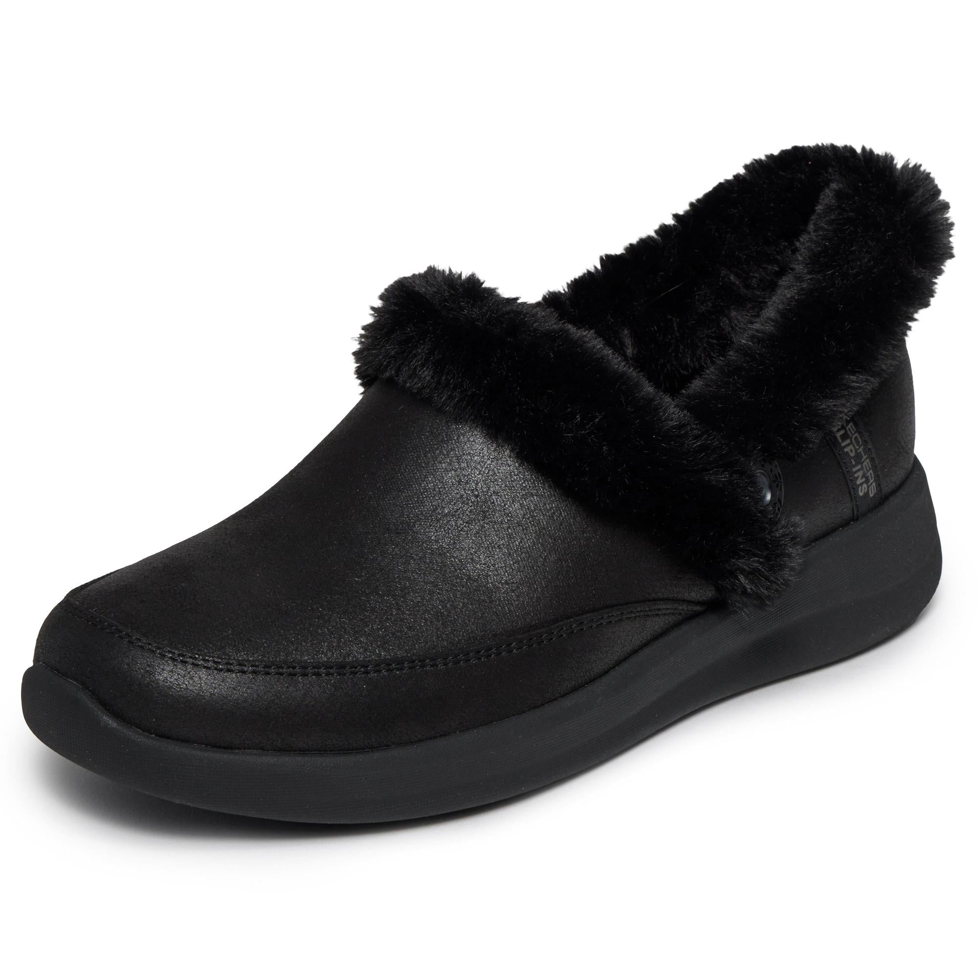 Skechers Cozy Escape slip-on ladies water-resistant vegan leather slippers with plush black faux fur lining.