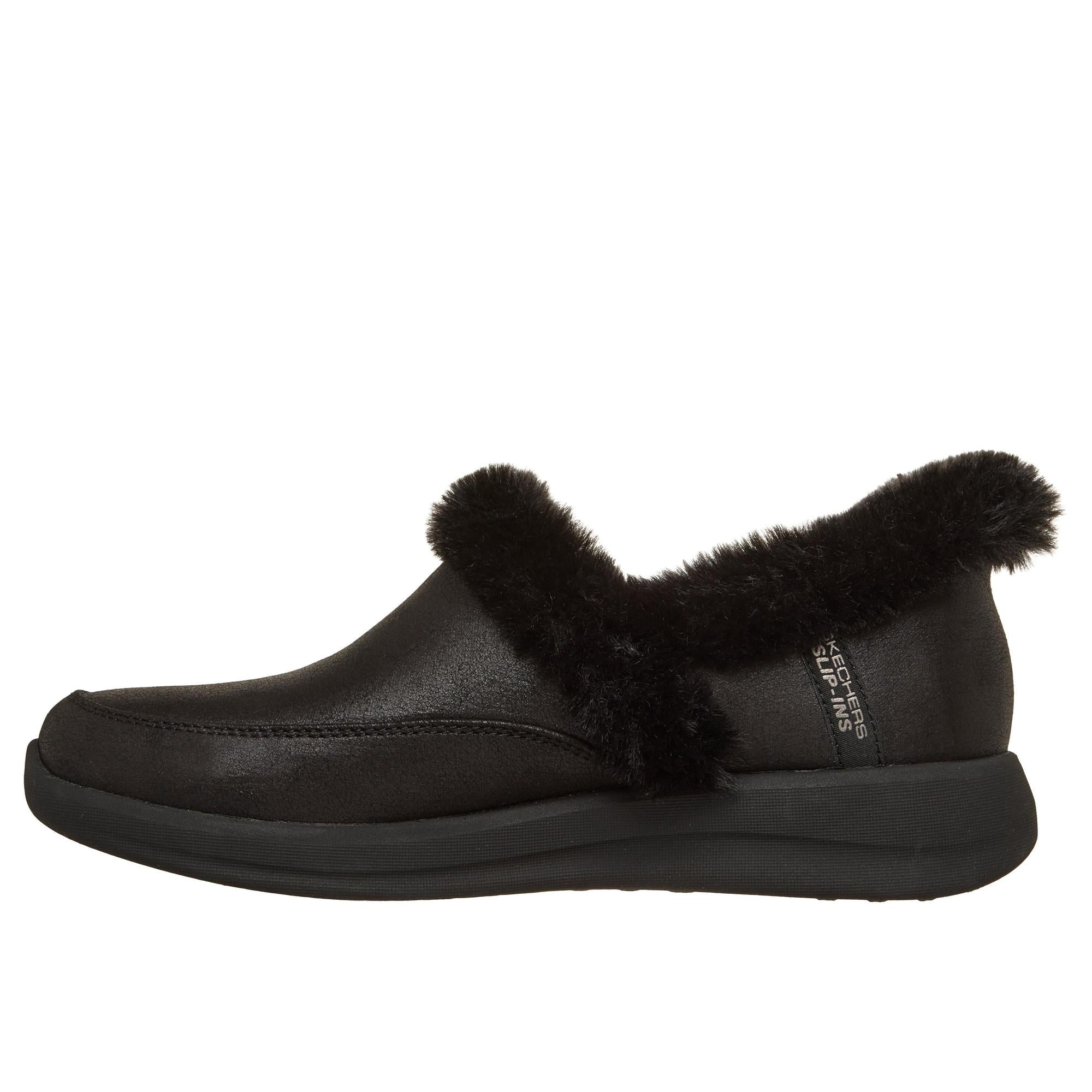 Skechers Cozy Escape slip-on slippers for women, black vegan leather, water-resistant with plush faux fur trim and flexible sole.