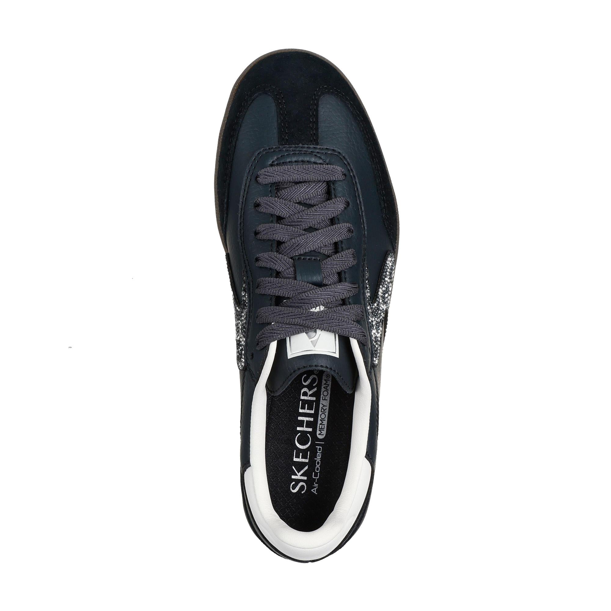 Skechers Hotshot ladies' slip-on trainers in black and white with shimmering spots, leather and textile upper, cushioned memory foam insole.