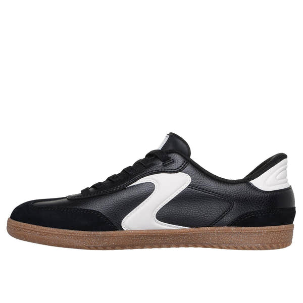 Skechers Hotshot women's black and white slip-on trainers with leather and textile upper, cushioned sole, and gum rubber outsole.