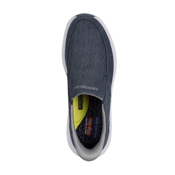 Skechers men's navy textile slip-on trainers with memory foam insoles and white sole, casual athletic footwear.
