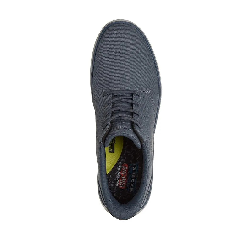 Skechers Hyland-Justino men's navy vegan slip-on trainers with breathable upper and cushioned insole.