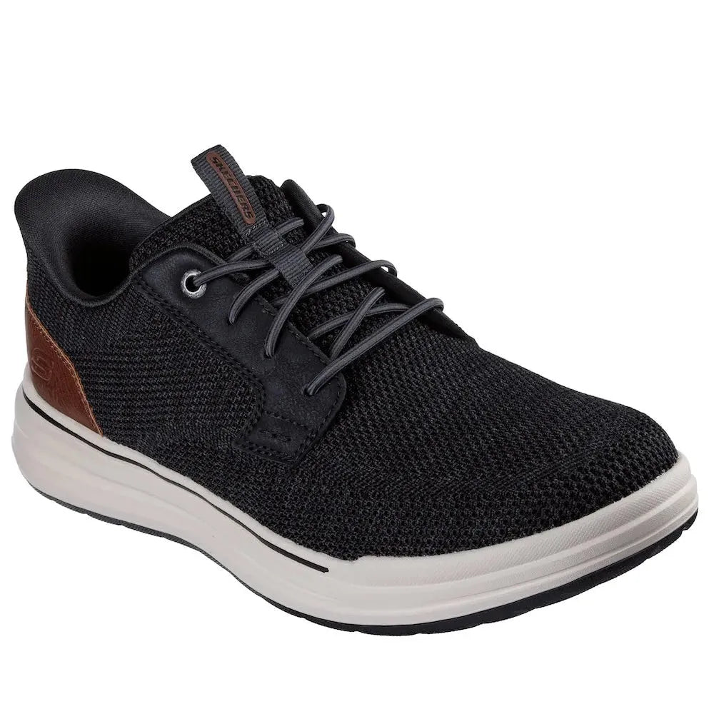 Skechers Sterling-Ramone men's black vegan slip-on trainers with breathable mesh upper and white sole.