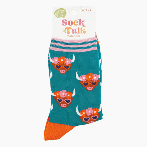 Sock Talk bamboo socks in teal with Highland cow and floral crown pattern, featuring pink and orange accents, size UK 3-7.