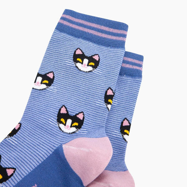 Blue bamboo socks featuring pink stripes and cute black and white cat faces, size medium, breathable and stretchy.