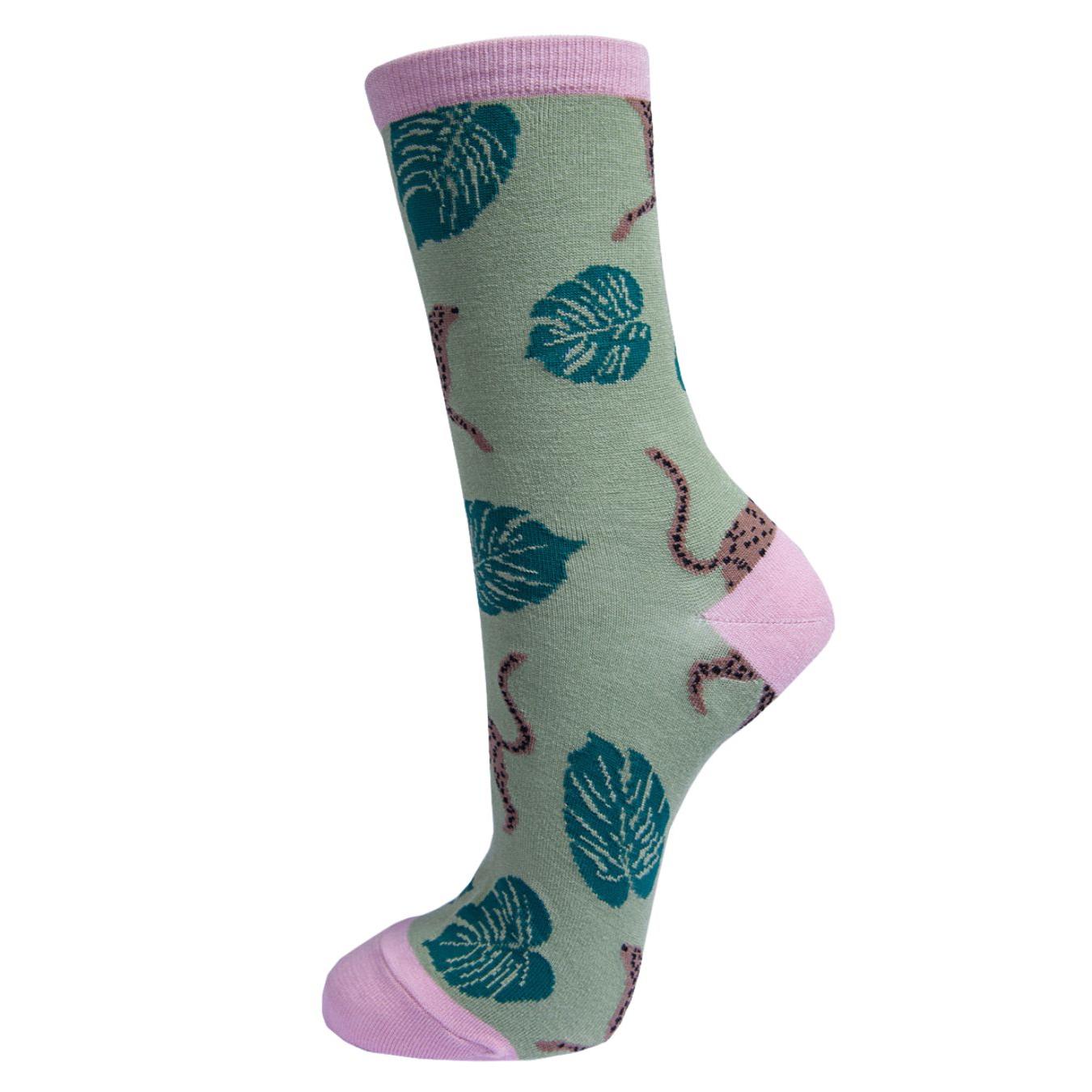 Sock Talk green bamboo leopard print ankle socks with cheetah design, pink accents, and leaf pattern.