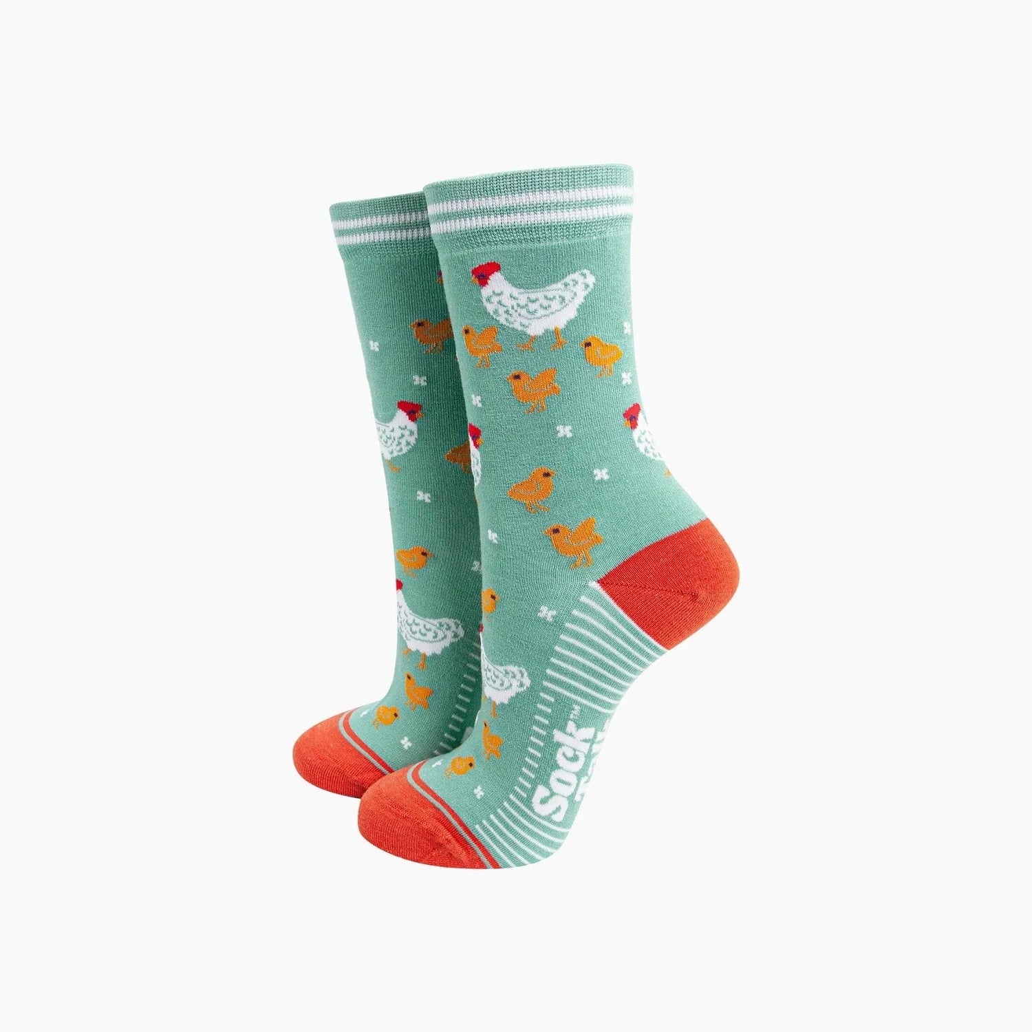 Sock Talk Hens and Chicks bamboo socks in green with chicken and chick pattern, orange toes and heel, and white striped accents.