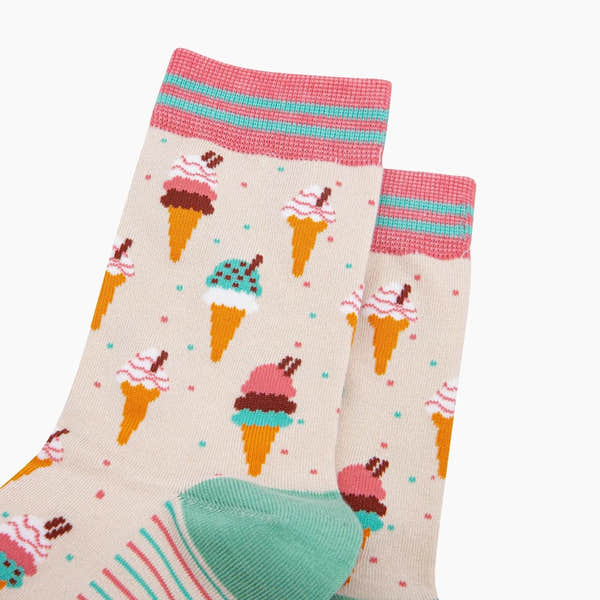 Sock Talk ice cream cone bamboo socks in cream with colorful ice cream cone patterns, pink striped cuffs, and mint green heel.