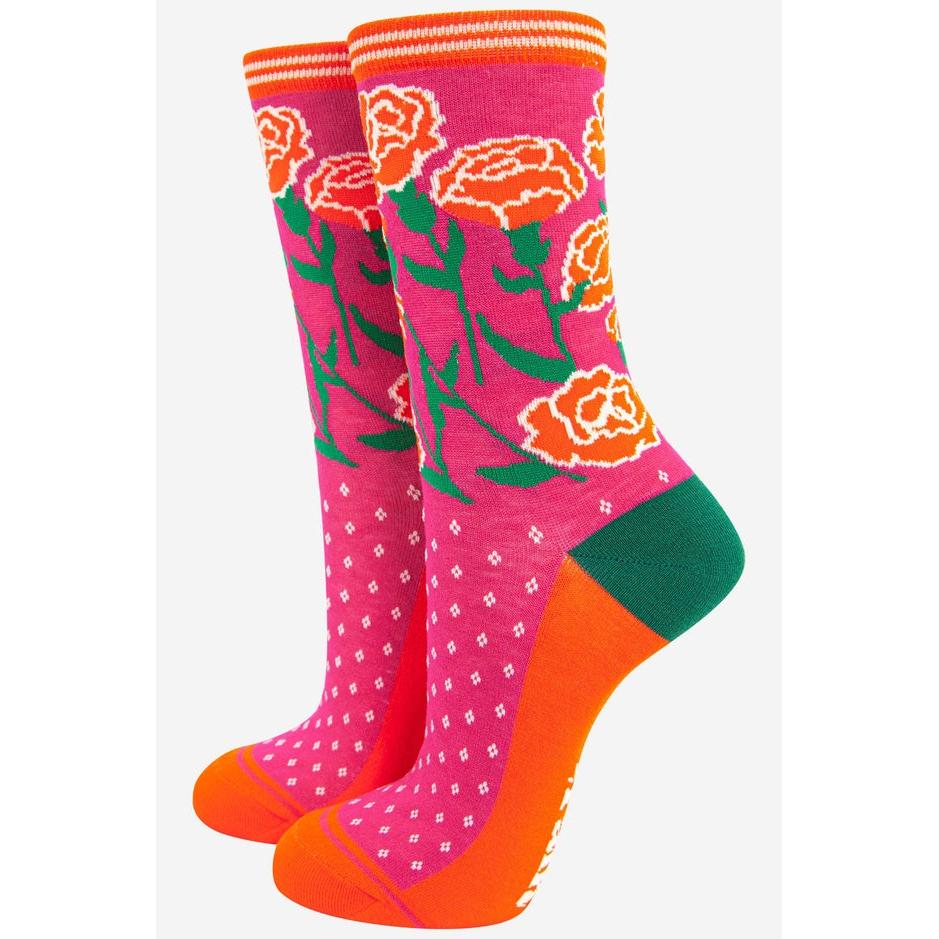 Sock Talk Ladies Carnation Floral Print Bamboo Socks with pink, orange, green, and white floral design and polka dot pattern.