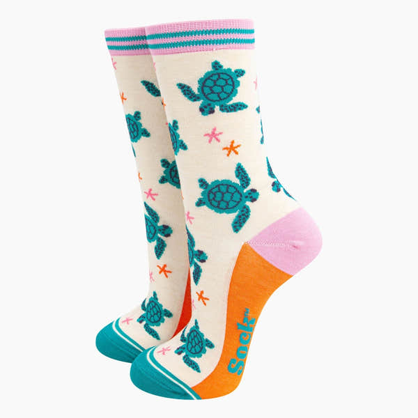 Sock Talk Ladies Cream Sea Turtles and Starfish bamboo socks with colorful turtle and starfish pattern, pink, orange, and teal accents.