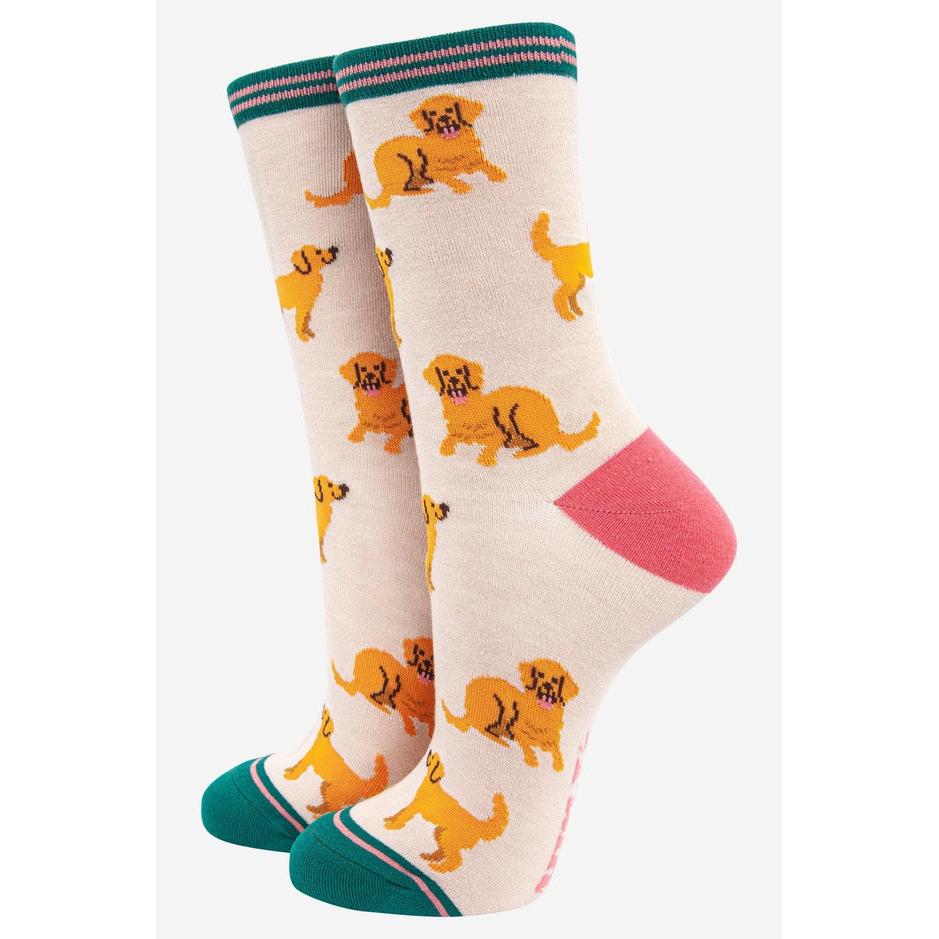 Sock Talk Ladies Golden Retriever Bamboo Dog Socks with playful dog pattern, cream, pink heel, and green toe and cuff.