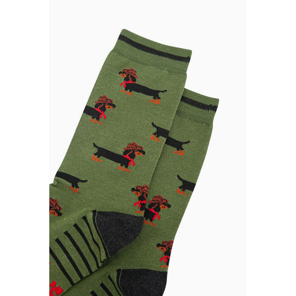 Men's green bamboo socks featuring a Sausage Dog cowboy design with black and orange accents.