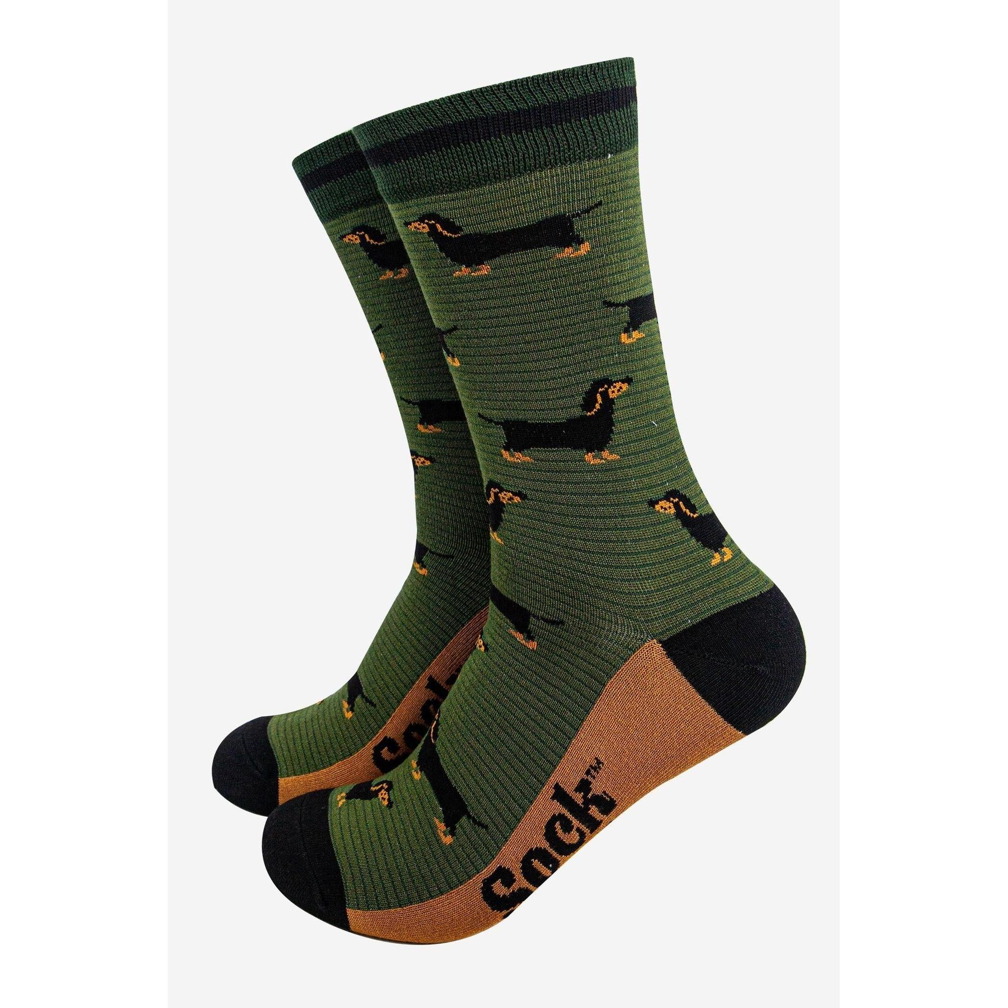 Men's bamboo socks with sausage dog and stripe pattern in khaki and dark green, featuring black toes and heels.