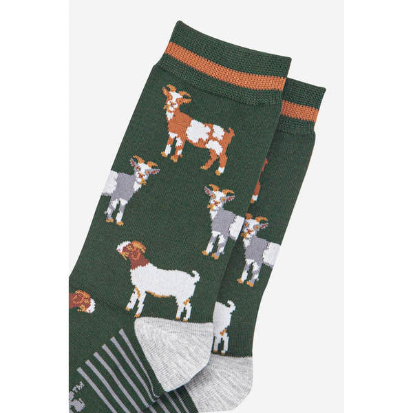 Sock Talk men's bamboo socks with khaki/tan goat pattern, green background, and gray heel and toe detail.