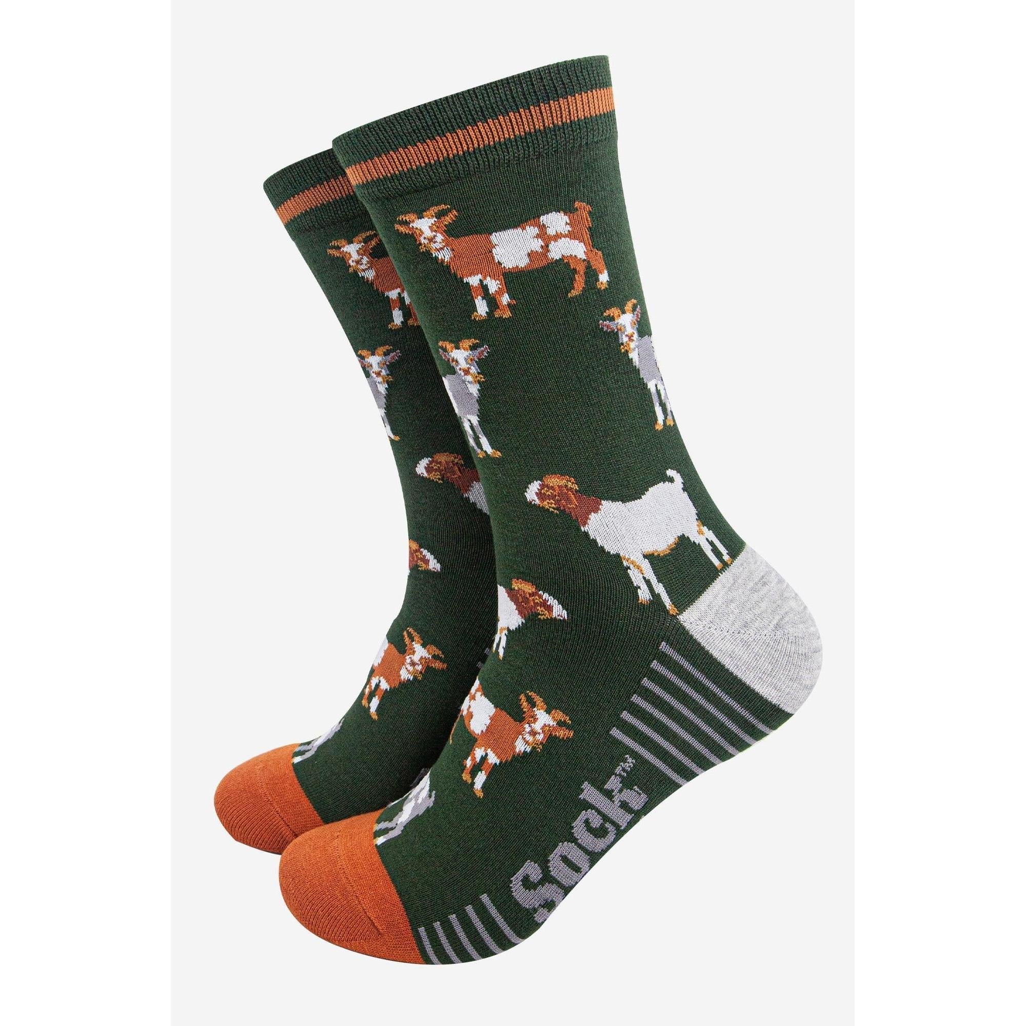 Sock Talk men's bamboo socks with khaki/tan goats pattern, green base, orange toes, and gray heel detail.