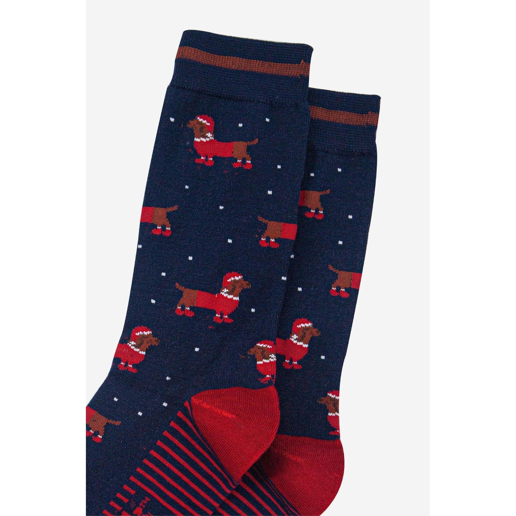 Sock Talk men's bamboo socks featuring navy blue and red Santa sausage dog pattern, festive holiday design.