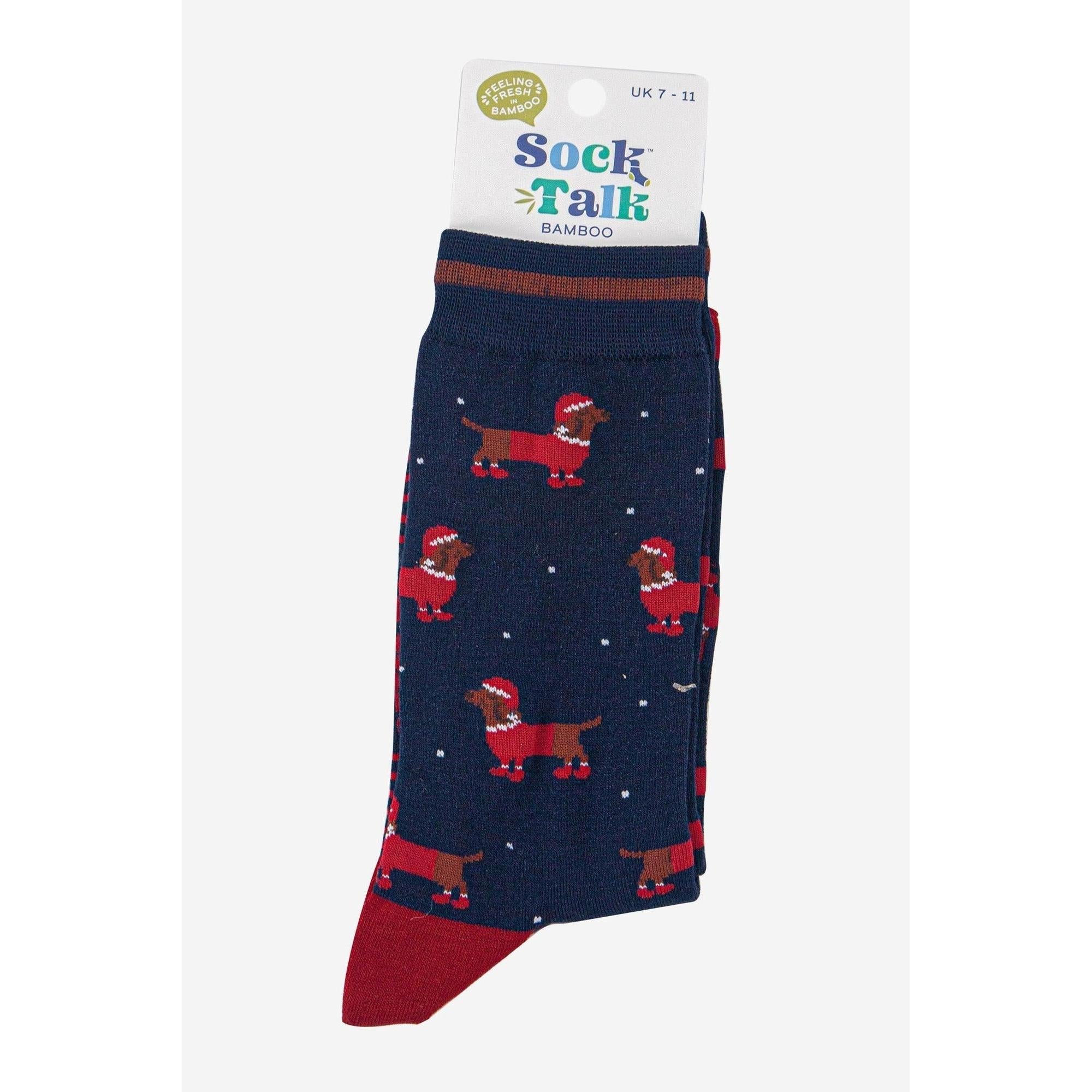 Sock Talk men's navy blue bamboo socks with red Santa sausage dog pattern, holiday-themed winter footwear.