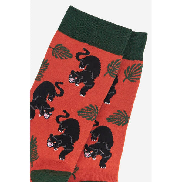 Sock Talk Men's Prowling Black Panther Jungle Leaf Print Bamboo Socks, black panther design with green leaves on red background.