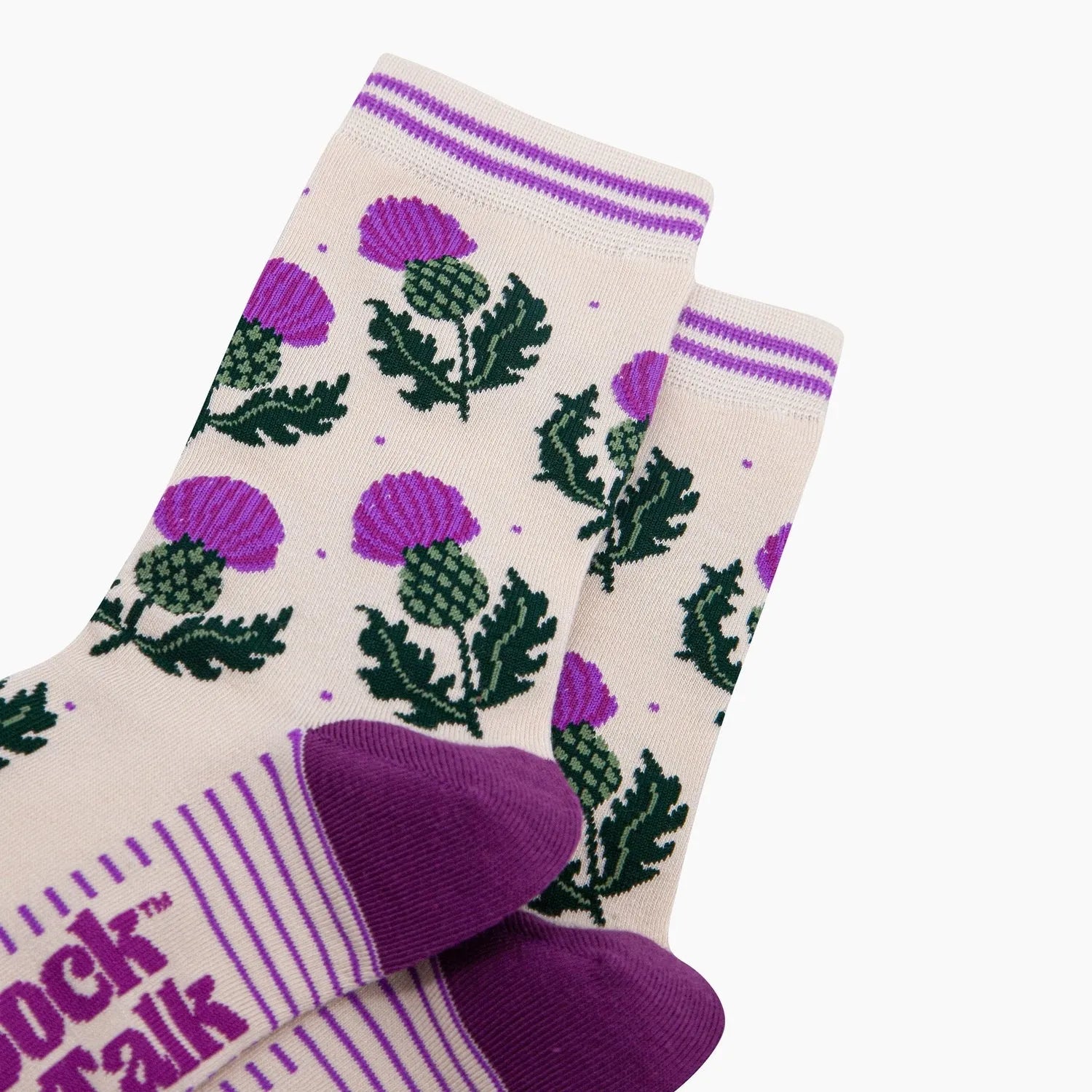 Sock Talk Scottish Thistles bamboo socks in cream with purple and green thistle print and striped cuffs.
