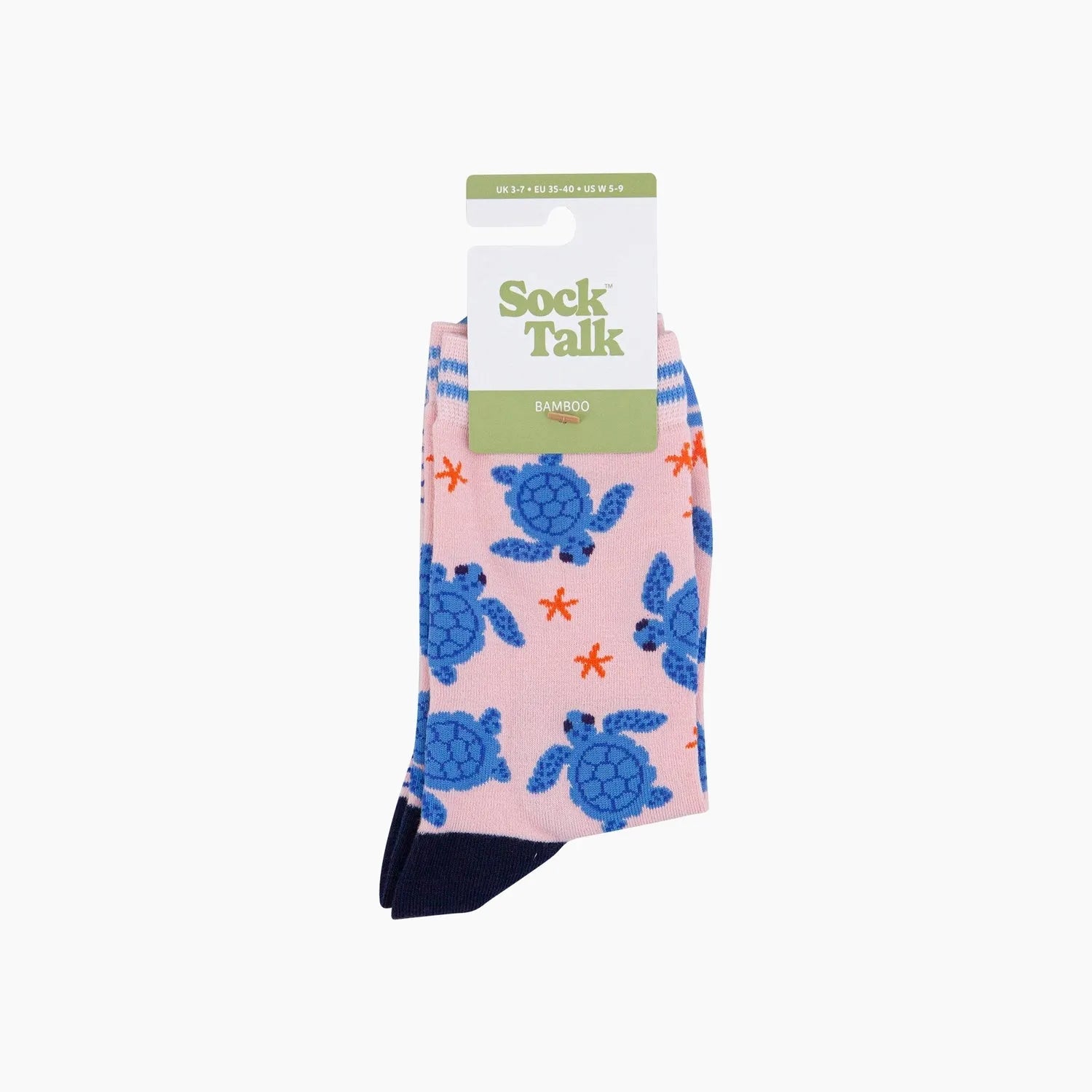 Sock Talk sea turtle bamboo socks in pink with blue turtles and orange accents, size US 5-9.