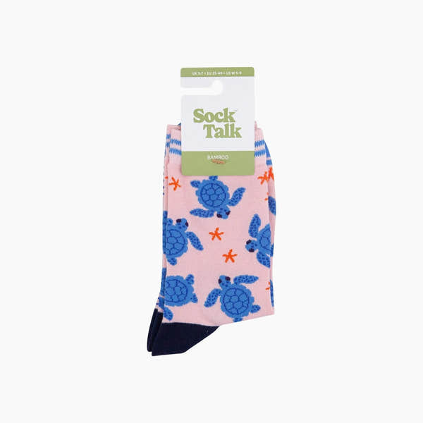 Sock Talk sea turtle bamboo socks in pink with blue turtles and orange accents, size US 5-9.