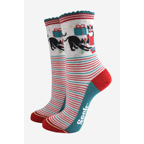 Sock Talk women's bamboo holiday socks featuring grey, red, and white stripes with Christmas cats and presents design.
