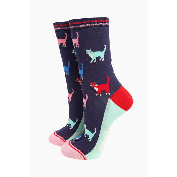 Sock Talk women's navy cat-patterned socks gift box, colorful cats, red heel toe, fun and cozy design.