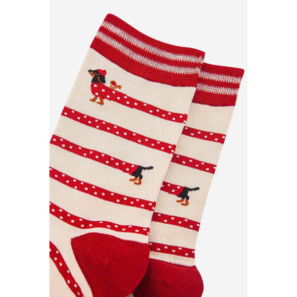 Sock Talk Women's Winding Sausage Dog Cream and Berry bamboo socks with dog pattern, red and cream stripes, and ribbed cuffs.
