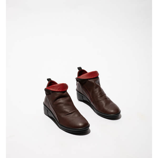 Softinos RARA808SOF women's wine-colored leather ankle boots with side zip and wedge heel.