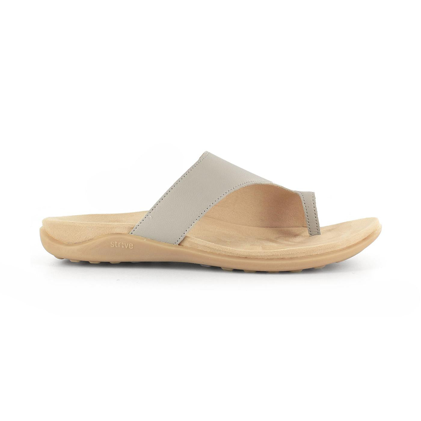 Strive Capri III ladies latte leather slip-on sandals with arch support, beige strap, and cushioned footbed.