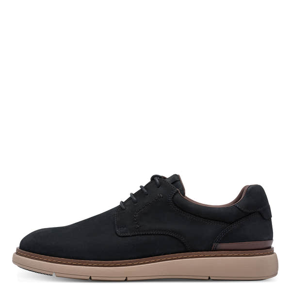 Outer side of the navy Tamaris lace-up shoe showing the leather upper, stitching and low heel.
