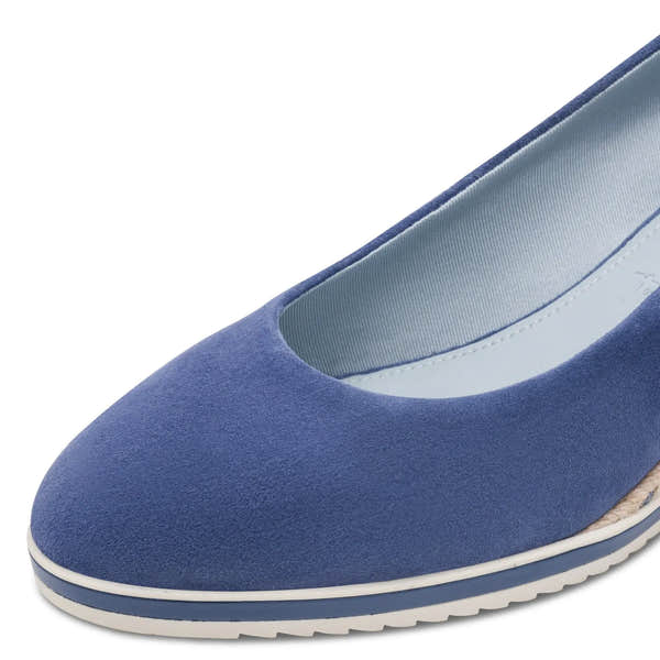 Blue leather slip-on shoes with a rounded toe, cushioned interior, and white-rimmed sole.