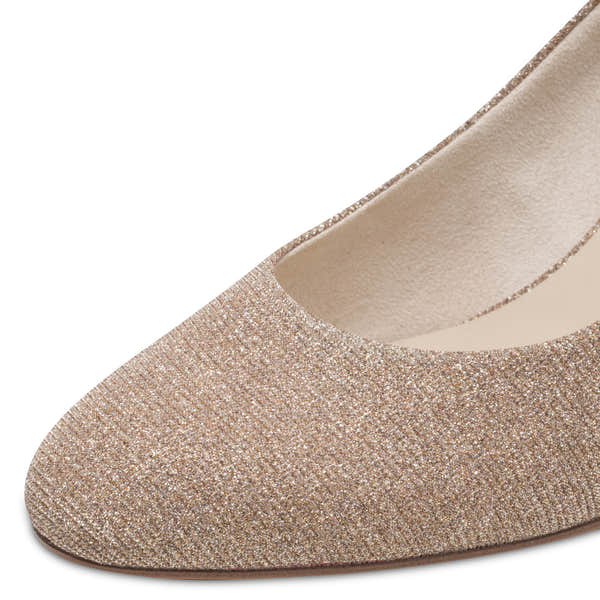Close-up of the rose gold textile Tamaris court shoe showing the textured textile upper, edge trim and heel.