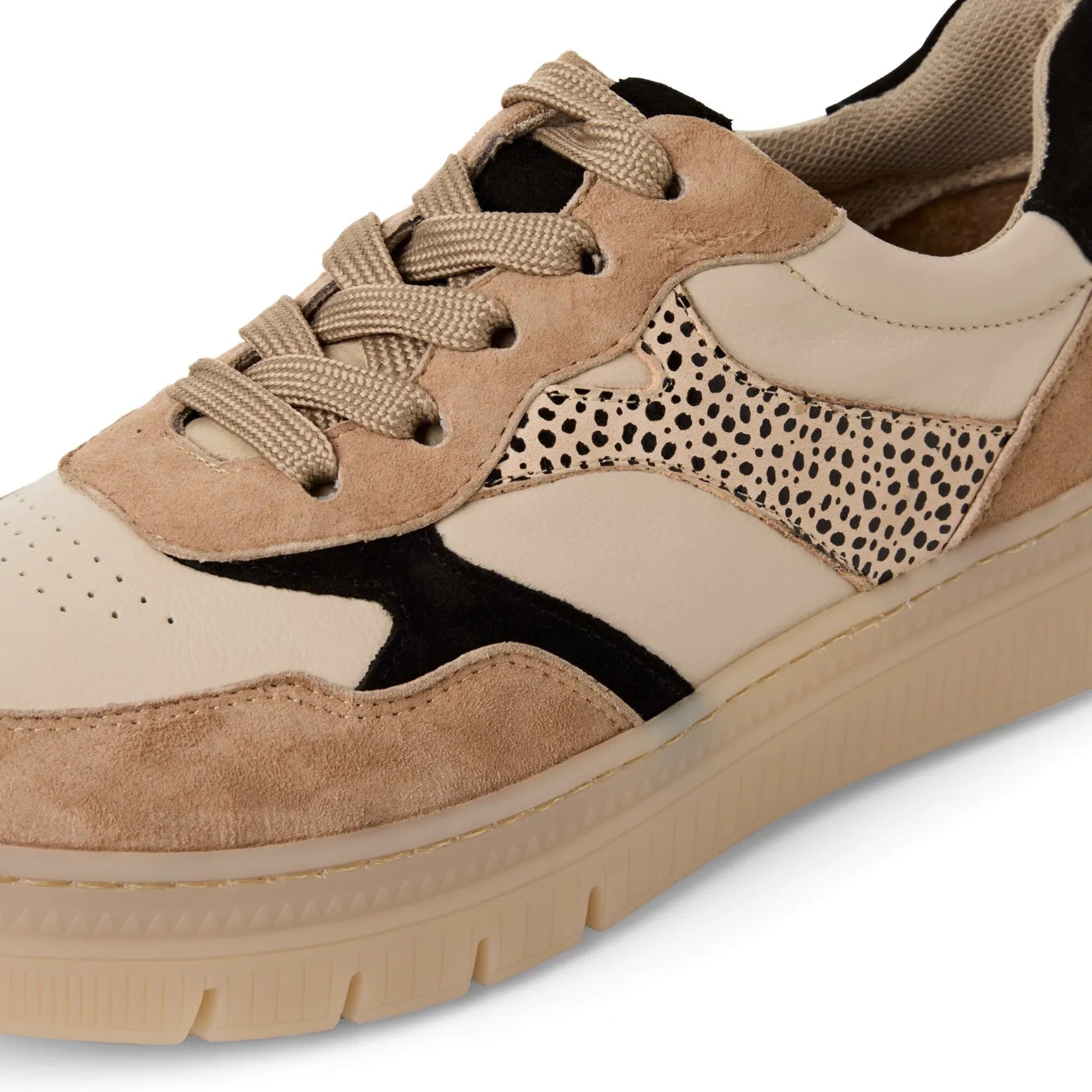 Tamaris beige and black leather lace-up women's sneakers with mixed materials and animal print accents.