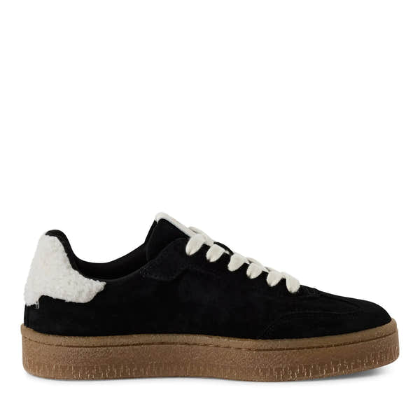 Tamaris ladies black and white lace-up trainers with faux fur detail, leather and textile upper, and chunky gum sole.