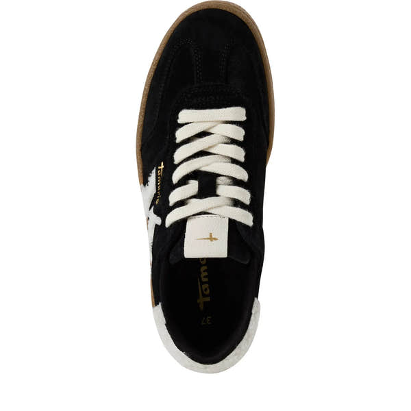 Tamaris women's black and white lace-up trainers with fur detail, leather and textile upper, and brown rubber sole.