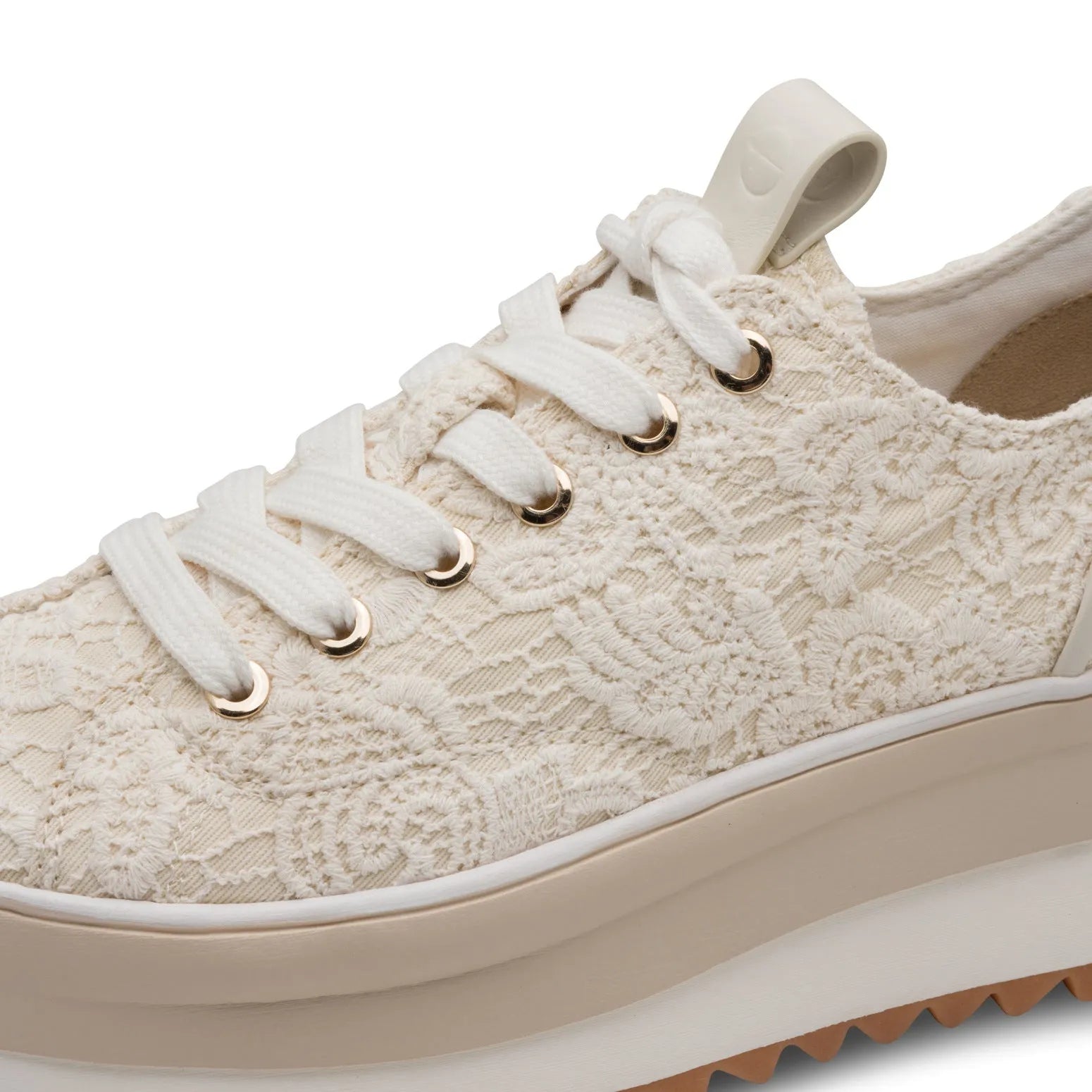 Tamaris ladies ivory lace-up shoes with textured textile upper, white laces, and chunky sole.