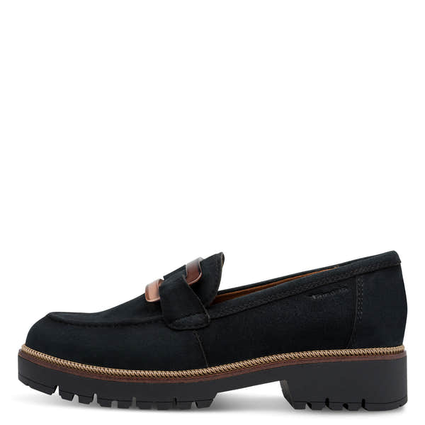 Outer side of the navy Tamaris loafer showing the suede leather upper, stitching and low heel.