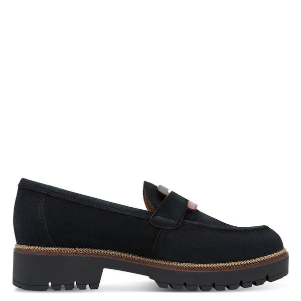 Inner side of the navy Tamaris loafer showing the loafer profile and low heel.