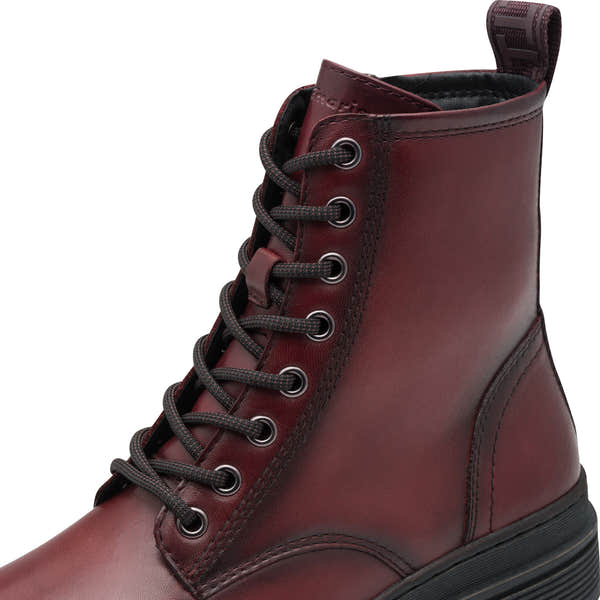 Tamaris women's red leather ankle boots with lace-up front, zip closure, chunky sole, and ankle pull tab.