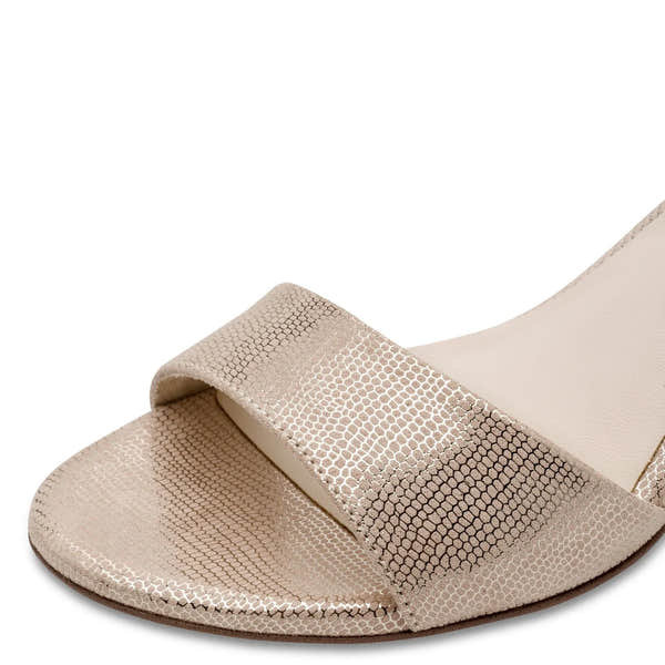 Light gold textile women's block heel sandal with buckle detail.
