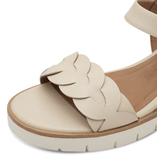 Tamaris 28258-44 ivory leather touch-fastening women's sandals with floral cutout design and chunky sole.