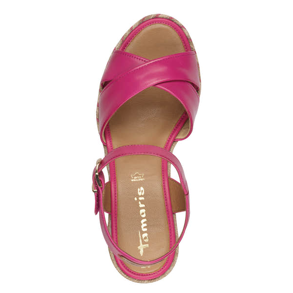 Tamaris women's fuchsia leather buckle sandals with crisscross straps and cushioned footbed.