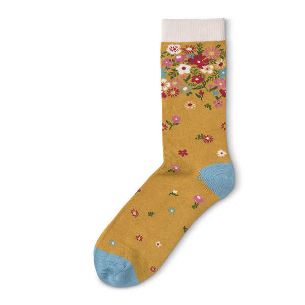 Women's mustard yellow socks with floral pattern, light blue heel and toe, from The Quintessential Ladies Socks - Amelia Mustard collection.