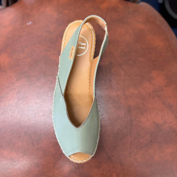 Toni Pons Bernia P women's Spanish mint leather slip-on sandals with open toe and braided sole detail.